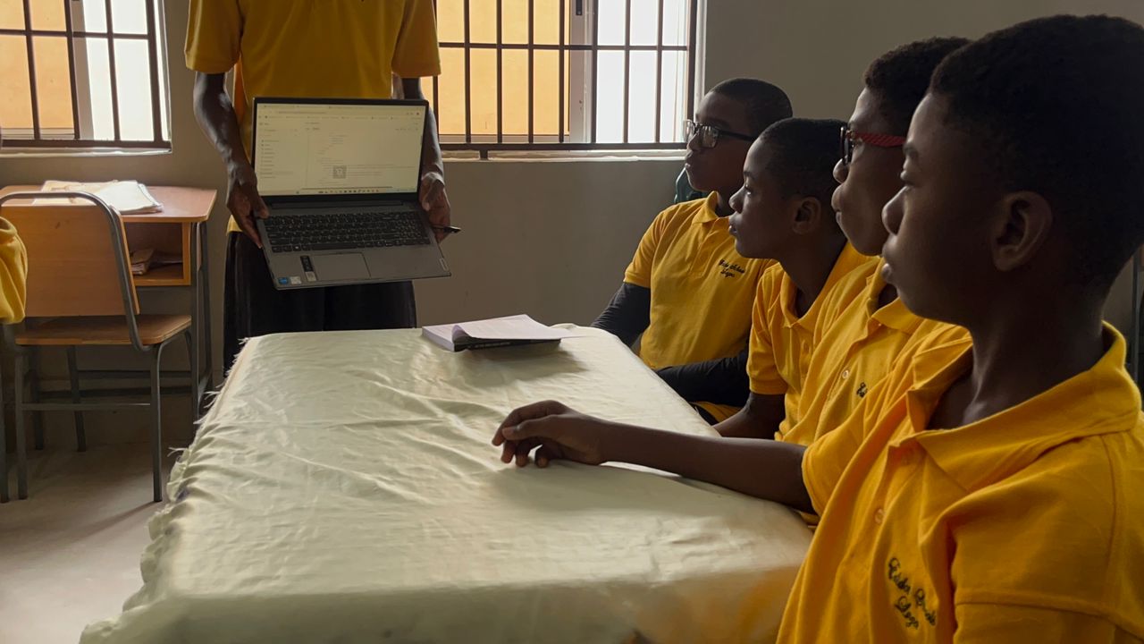 Young participants coding during Tech for Good workshop
